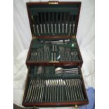 Mahogany canteen of 20thC silver cutlery for eight persons, consisting of silver handled knives (