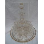 19thC liqueur decanter, eight glasses and tray with engraved decoration of grape vines