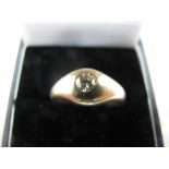 Gent's solitaire diamond ring in a gold setting, size L