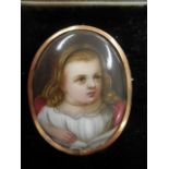 Rose gold oval pendant brooch with porcelain plaque showing a young girl