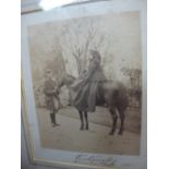 Rare photograph of Queen Victoria on horseback and John Brown holding reins. Signed, dated Windsor