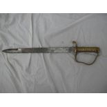 Victorian brass handled sawback sword marked M.A.5.98 - 6, length 27.5 ins.