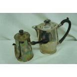 Victorian silver chocolate pot with ebony handle, London 1887 and a hot water jug 1901, 25 ozt.