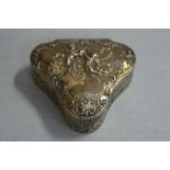 Late Victorian chased silver club shaped ring box with decoration of cherubs, flora and fauna,