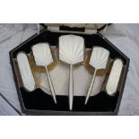 Art Deco silver and translucent enamel five piece dressing table set cased, Chester 1939 maker