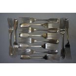 Set of twelve Victorian silver fiddle pattern table forks, London 1852, maker Eliz. Eaton, 32 ozt.