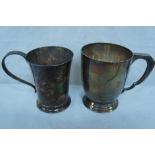 Two silver pint tankards London 1935 maker E B and Birmingham 1937 maker H & H total weight 21 ozt.