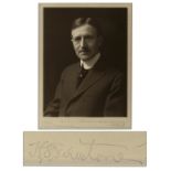 Vintage portrait photo signed by its wealthy subject upon the lower border, ''H.S. Firestone''.
