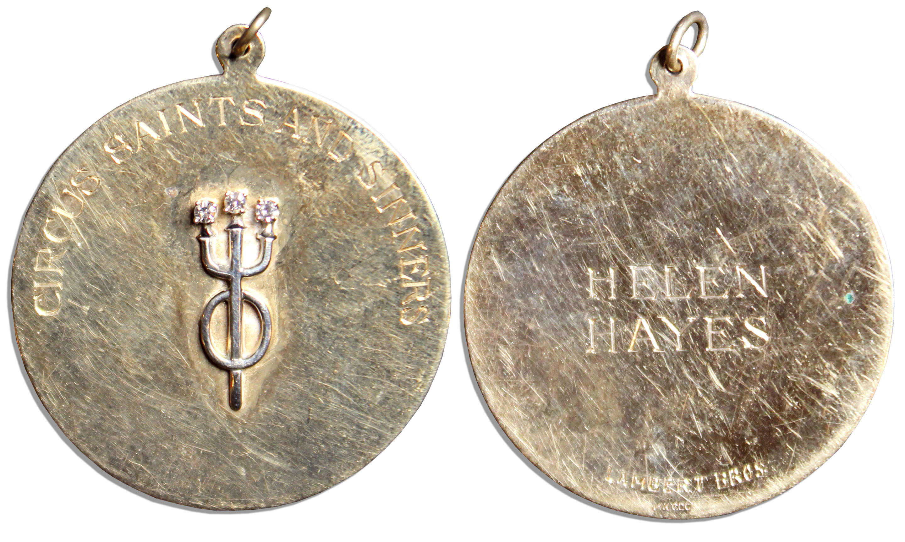 Helen Hayes' ''Circus Saints and Sinners'' gold medal adorned with a triad of diamonds. Hayes