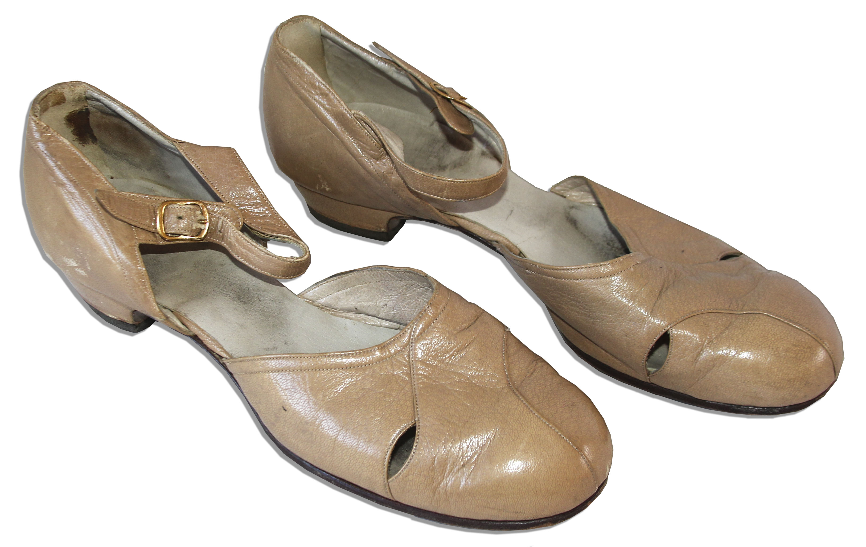 Semi-formal shoes worn by legendary actress Greta Garbo. Tan leather flats feature a buckle