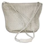 Handbag owned by legendary actress Greta Garbo. Off-white woven leather Ganson handbag features a