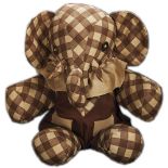 Shirley Temple's very own toy elephant, from her playroom. Made of brown and white checkered