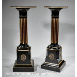 A Pair of Neoclassical-Style Brass-Mounted Parcel Gilt and Ebonized Pedestals, lozenge molded tops