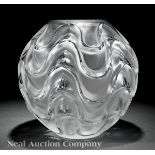 A Lalique "Vibration" Clear Crystal Vase, c. 2006, engraved "Lalique France", globe form, embossed