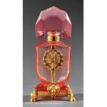 A Fine Austrian Enameled and Jeweled Bronze-Mounted Pink Cut Crystal Perfume Bottle, shield form,