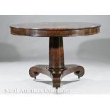 American Classical Mahogany Tilt?Top Center Table, early 19th c., segmented flame veneered top,