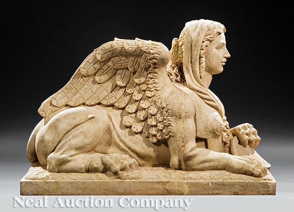 Pair of Classical?Style Cast Sandstone Sphinxes, 20th c., females in opposing recumbent positions,