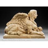 Pair of Classical?Style Cast Sandstone Sphinxes, 20th c., females in opposing recumbent positions,