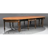 Large Georgian Carved Mahogany Four Part Banquet Table in the Adam Taste, probably 19th c., demilune