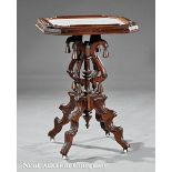 American Renaissance Carved Walnut Table, late 19th c., inset marble top in strapwork frame,