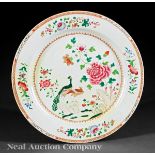 Chinese Export Famille Rose Porcelain Dish, 18th c., circular body with wide flat rim, decorated