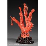 Large Chinese Coral Figural Group, carved as three figures standing and seated atop a phoenix