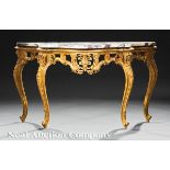 Louis XV?Style Carved and Gilded Console Table, 19th c., serpentine variegated marble top, pierced