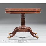 American Classical Carved Mahogany Games Table, early 19th c., foldover top with canted corners,