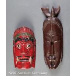 Three Indonesian and African Carved Wood Masks, first, Indonesian, polychrome painted, h. 12 in.;