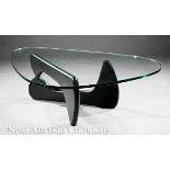 Isamu Noguchi?Style Coffee Table, shaped glass top, ebonized wood base, h. 15 1/2 in., w. 49 in., d.