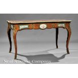 Napoleon III Carved Rosewood, Porcelain and Bronze?Mounted Bureau Plat, late 19th c., inset tooled