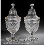 Pair of English Neoclassical Cut Glass Covered Urns, early 19th c., fluted diamond pattern bodies