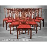 Set of Twelve Chippendale?Style Carved Mahogany Dining Chairs, 20th c., two armchairs and ten side