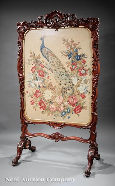 American Rococo Carved Walnut Floor Screen, mid‑19th c., pierced shell crest, foliate frame,