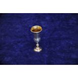 An Edward VII miniature silver kiddush cup, the tapering body with zigzag decoration and bulbous