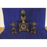 An Edwardian slate clock garniture, the clock with bronze bust of a lady wearing a tiara. The