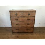 A 19th century oak chest of two short and three long drawers, on shaped bracket feet (af). 33ins