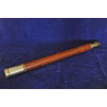 A Ross London telescope with brown leather casing. Number 48569 with change of power adjuster.