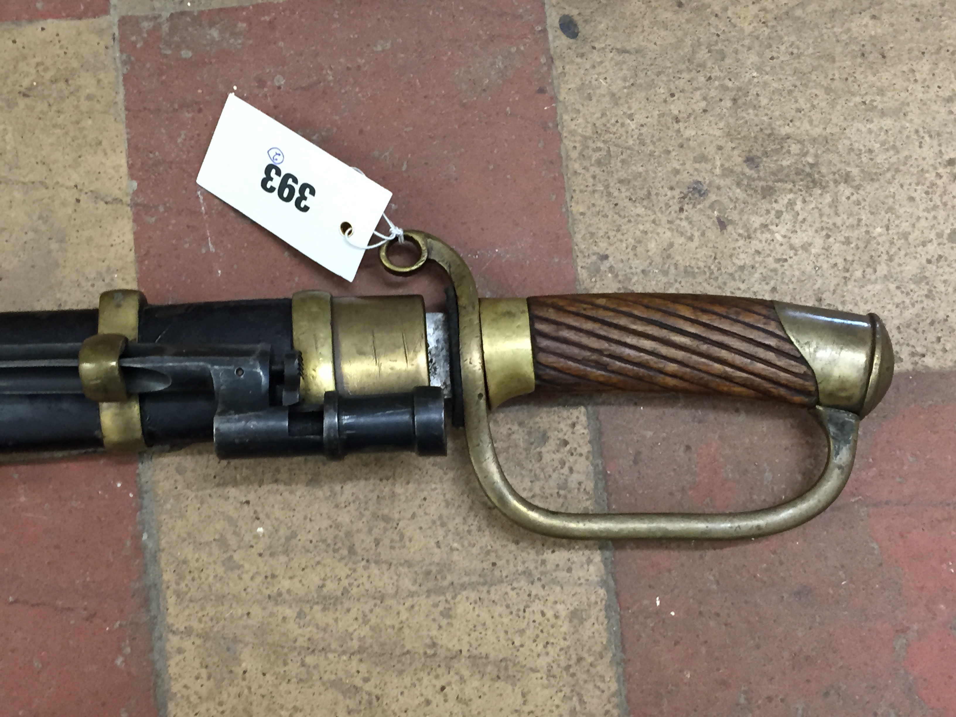 A Russian 1917 cavalry sword with 31½ins blade, wooden grip and brass hilt together with its black - Image 2 of 19