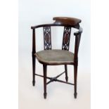 An Edwardian bedroom chair with boxwood and ebony stringing to the cresting rail and pierced splat