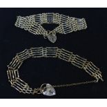 A five-bar gate bracelet and a six-bar gate bracelet, each with heart-shaped clasp, approximately 27