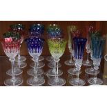 A set of twelve Saint-Louis Hock glasses with coloured bowls and a set of six coloured glass