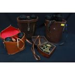 Two pairs of Barr & Stroud military pattern binoculars, a pair of Boots binoculars, a reproduction