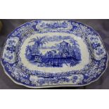 A Staffordshire pottery blue and white meat dish printed with the’ Triumphal Car' pattern, 42 x