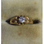 A yellow metal solitaire diamond ring, tested as 14ct or higher, set with a Victorian Old Cut