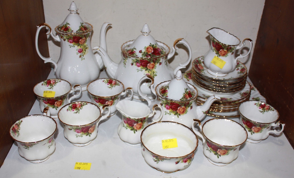 SECTION 6.  A Royal Albert, 'Old Country Rose', pattern of twenty-five pieces.