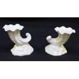 A pair of plain white small Worcester porcelain vases modelled as cornucopia shell, 7cm high