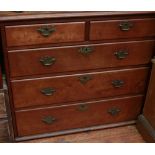 An Edwardian stained walnut chest of two short and three long graduated drawers, with brass