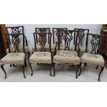 A set of eight mahogany Chippendale style dining chairs comprising two carvers and six standard
