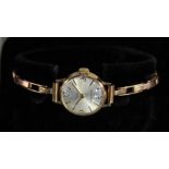 A ladies 1950s 9ct gold cocktail watch with 17-jewel movement and 9ct gold expanding bracelet, 13.